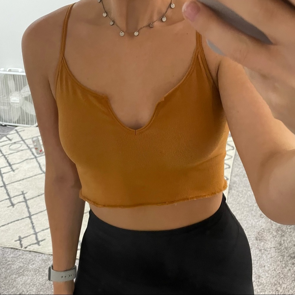 Out front under tank top